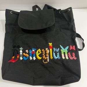 🌟 Adorable Black Disneyland Backpack with Disney Character Letters